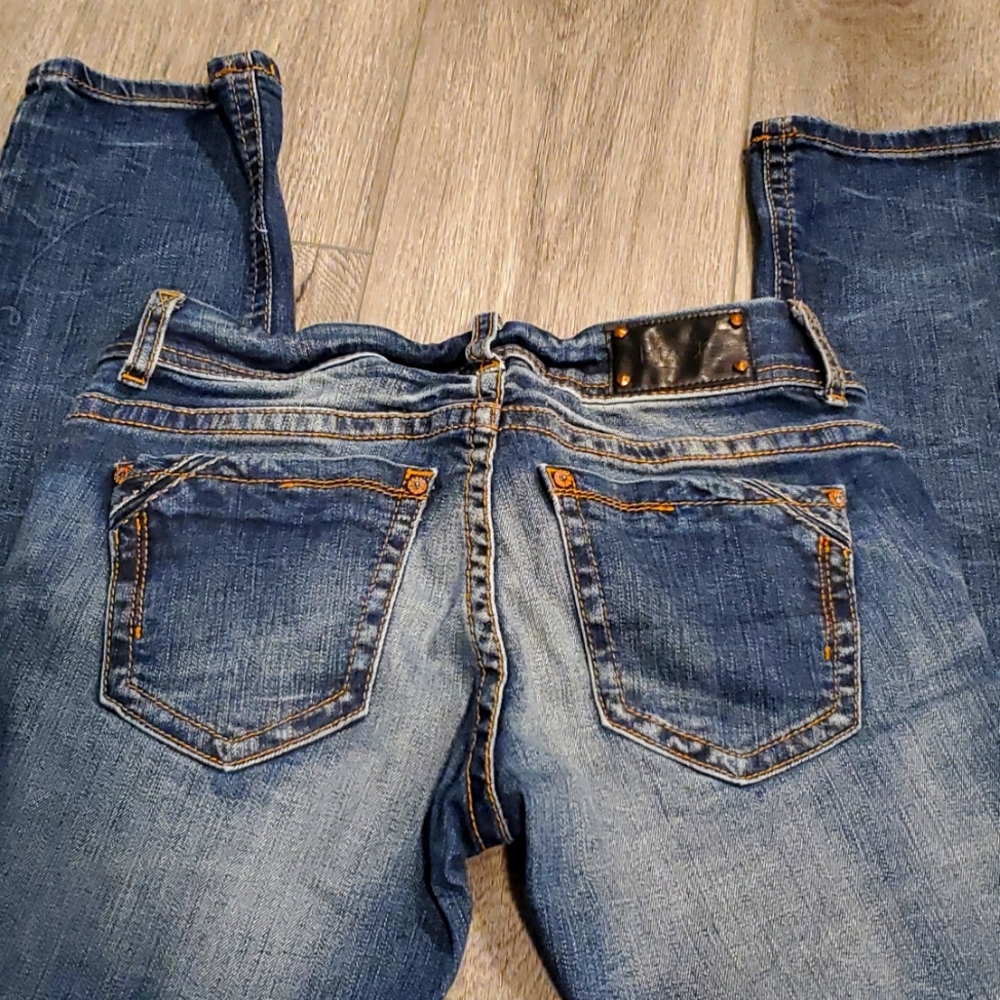 Buckle Black jeans. Straight leg. Size 26x32.